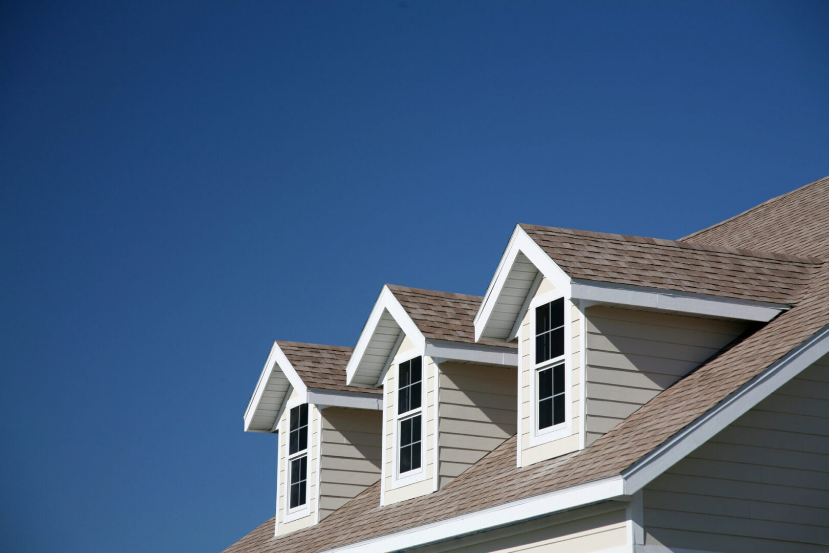 Gabled roof with blue sky background