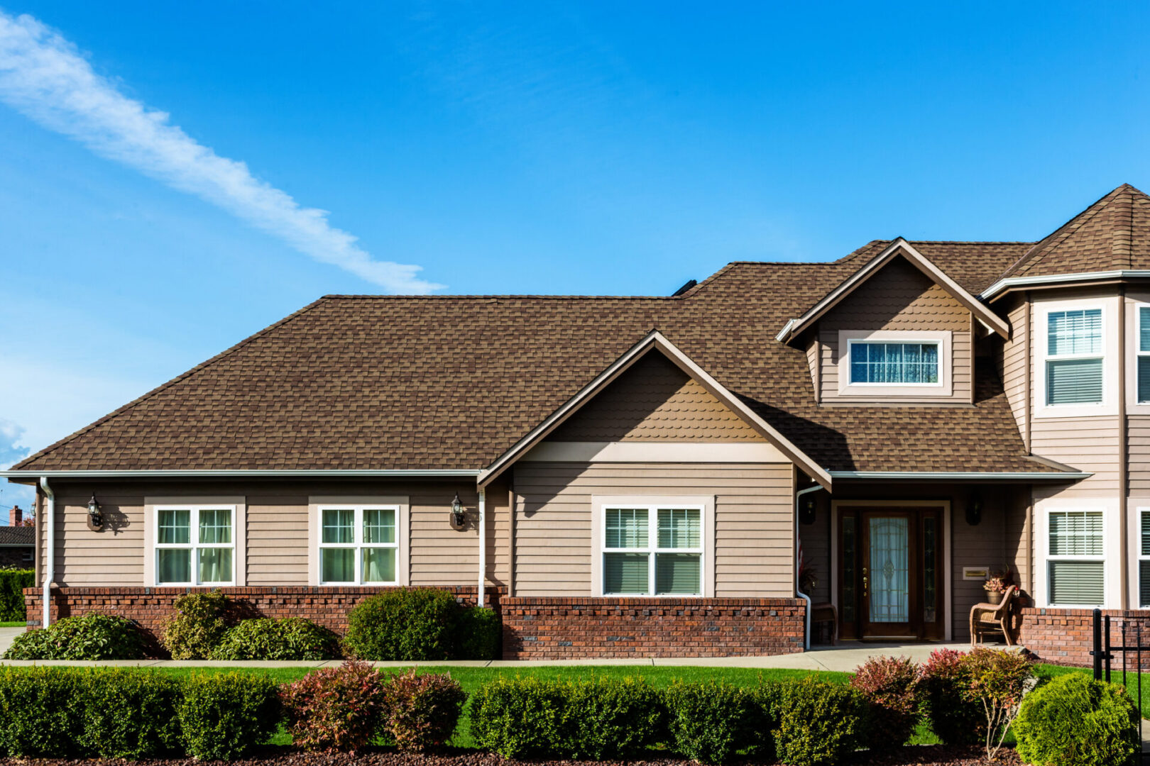 Two-story home under clear blue sky
