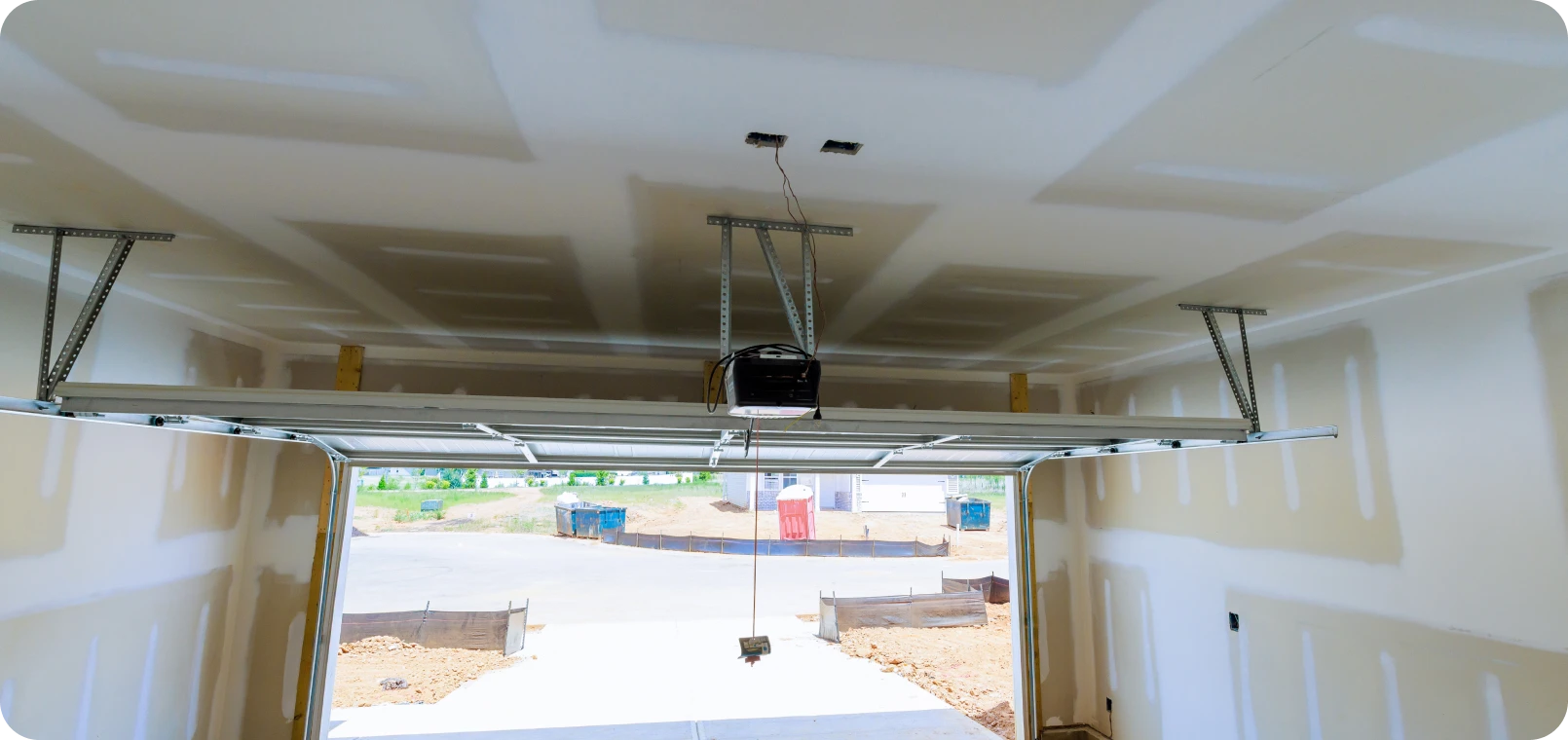 Garage interior showing ceiling and door tracks